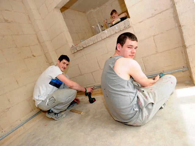 Students Max Patton & Connor Seaton in the Plastering Class at Doncaster Deaf School in 2012