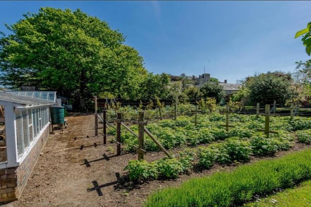 There are many gardens surrounding this house, such as the large front garden, with a sweeping driveway and the rear garden, surrounded by impressive mature trees. Additionally there is a hidden walled garden with a large vegetable patch and spacious greenhouses.