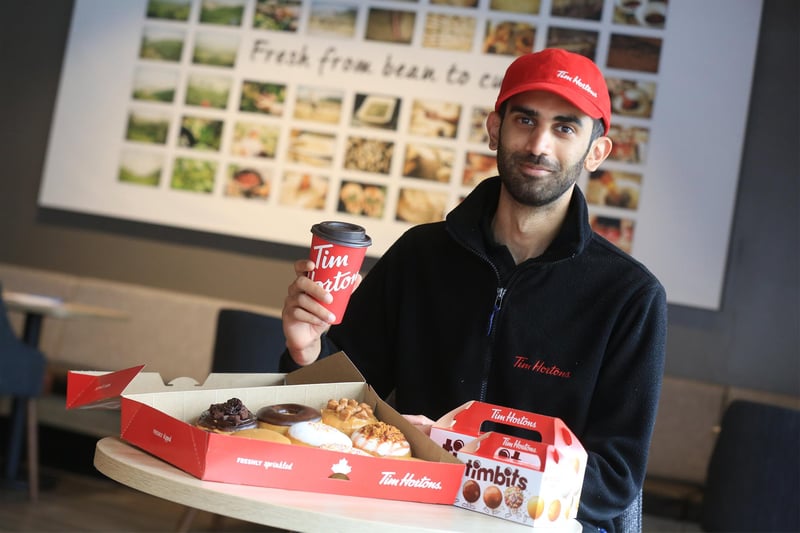 Tim Hortons, which is opening its first Sheffield restaurant, is already a Canadian institution. Pictured at the new branch is Aaysh Nazar
