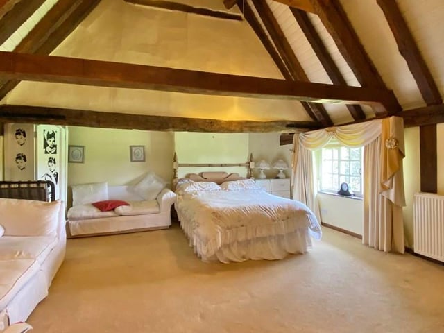 Another view of the first bedroom. It shows how much space there is.