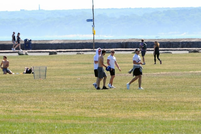 People were socially distancing on Southsea Common on Thursday, May 21 - the hottest day of the year. Picture: Sarah Standing (210520-2457)