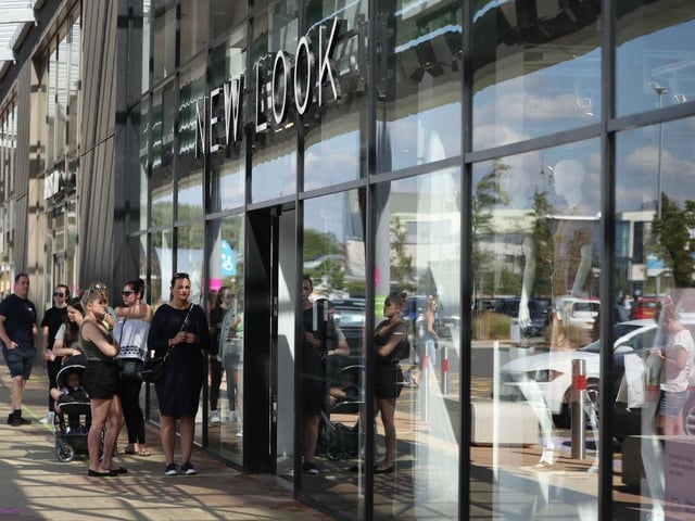 Shoppers patiently waited in socially distant queues outside New Look at the Rushden Lakes shopping complex in Northamptonshire.