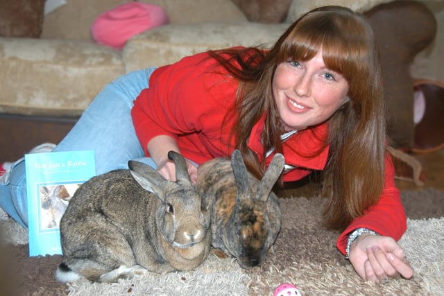 Joanne Keenan had a book about rabbits in 2009 and here she is with her house pets Winston and Angel.