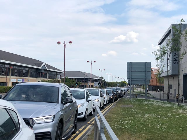 A passer-by said there were over 100 cars as Livingston McDonald’s on Almondale Avenue reopened today
