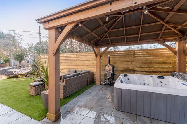 The garden has a great entertaining space with a hot tub.