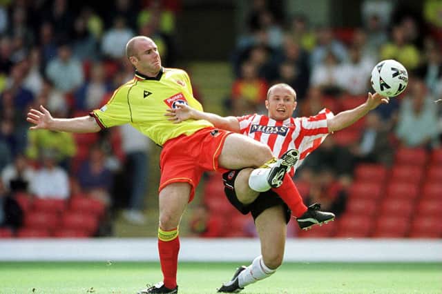 Robert Page of Watford tussles with Paul Devlin of Sheffield United: Tom Shaw/ALLSPORT