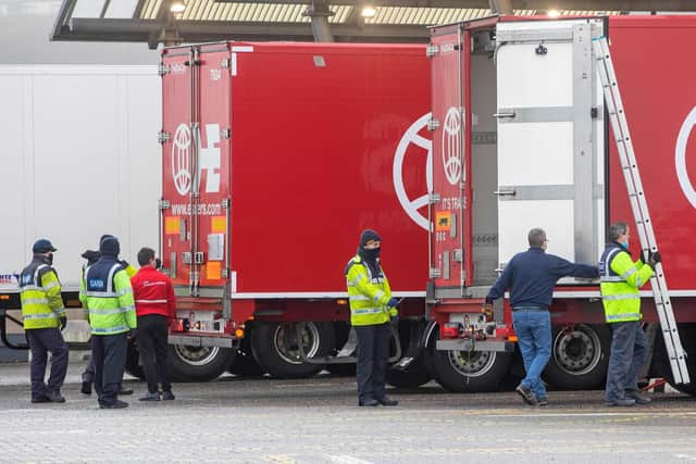 Garda officers check the trucks of lorries and HGVs after disembarking from the Stena Line ferry 'Kerry', following its arrival from Dunkirk, France. (Photo by PAUL FAITH/AFP via Getty Images)