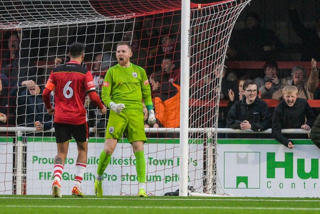 Ross Durrant celebrates his penalty save.