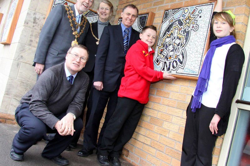 Highfield Hall Primary pupils Mollie Davies and Daniel Shelbourne with Chesterfield Mayor Cllr Adrian Kitch and Mayoress Inga Kitch, Cllr Terry Gilby and Tesco Regional Affairs Manager Tony Fletcher.  Pictured at Highfield Hall with the newly repositioned mosaics formerly at the Tesco Chesterfield store.