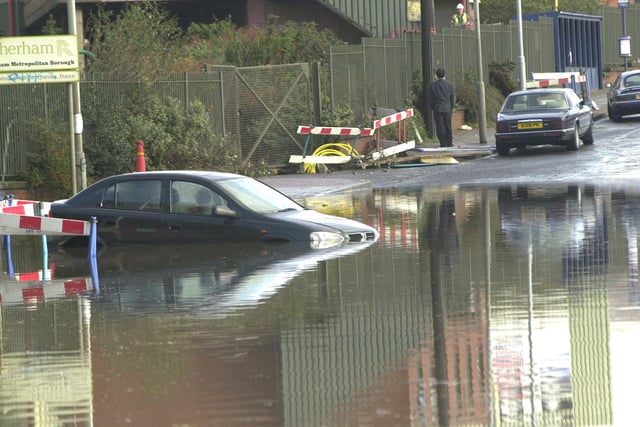 A car under water at Templeborough during the Sheffield floods of November 2000