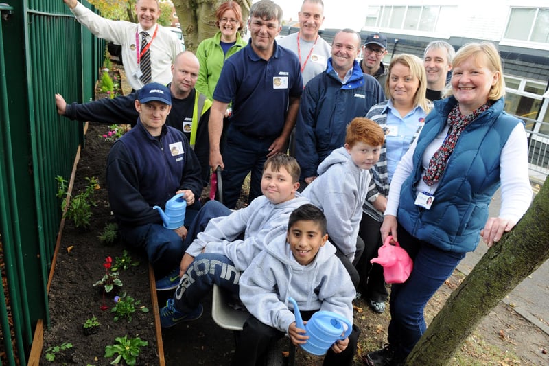Epinay School gardening club members and volunteers taking part in 'Get Your Grown-up Gardening Day' in 2014. Remember this?