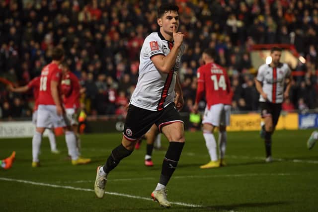 John Egan of Sheffield United celebrates his side's equaliser against Wrexham in the FA Cup: Gary Oakley / Sportimage