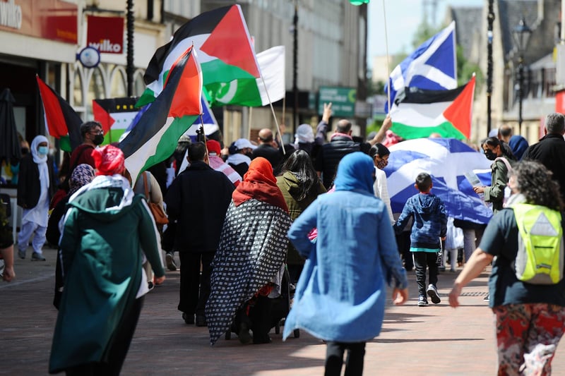 Those who attended the #FalkirkStandsWithPalestine peace rally called for justice during the town centre demonstration. Picture: Michael Gillen.