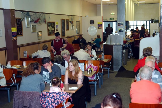 Diners tuck into their food in the busy cafe inside Mariners.