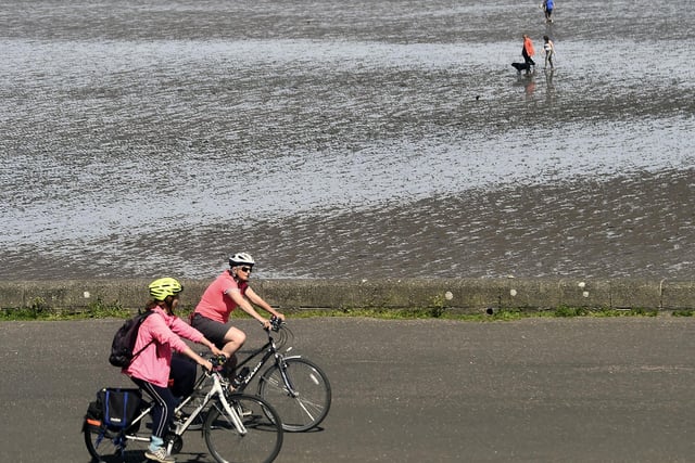 Cyclists enjoy the weather at Silverknowes.