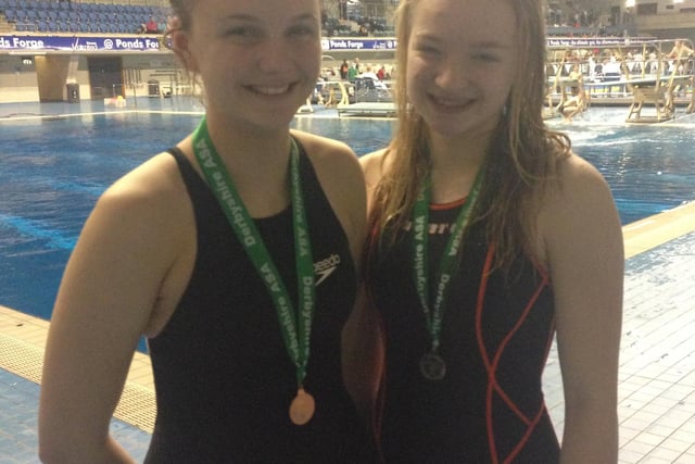 Buxton's Amy Johnson and Sophie Byrne after competing at the Derbyshire swimming long course sprint championships held at Ponds Forge.