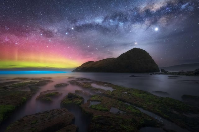 Northern Lights in Australia - Captured in this image is a trifecta of astronomical phenomena that made for some of the best astrophotography conditions one can witness in Australia, namely, the setting Milky Way galactic core, zodiacal light, and of course, the elusive Aurora Australis. On top of this, a sparkling display of oceanic bioluminescence adorned the crashing waves, adding the cherry on top to what was already a breathtaking experience.