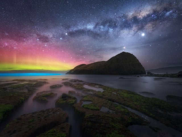 Northern Lights in Australia - Captured in this image is a trifecta of astronomical phenomena that made for some of the best astrophotography conditions one can witness in Australia, namely, the setting Milky Way galactic core, zodiacal light, and of course, the elusive Aurora Australis. On top of this, a sparkling display of oceanic bioluminescence adorned the crashing waves, adding the cherry on top to what was already a breathtaking experience.
