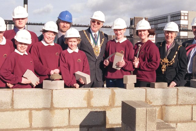 Myrtle Springs Bricklaying where pupils  Tony Paramore, Helen Barker, Craig Etches, Jonathan Wright, Ian Moore, Alex Goddard and Lucy Mellon pictured helping to lay bricks at the new Myrtle Springs School extension also pictured are the deputy headteacher Mr David Moxon,The Lord Mayor of Sheffield Councillor Trevor Bagshaw and Margaret Bagshaw  and Paul Holmes of the Sheffield Education Department