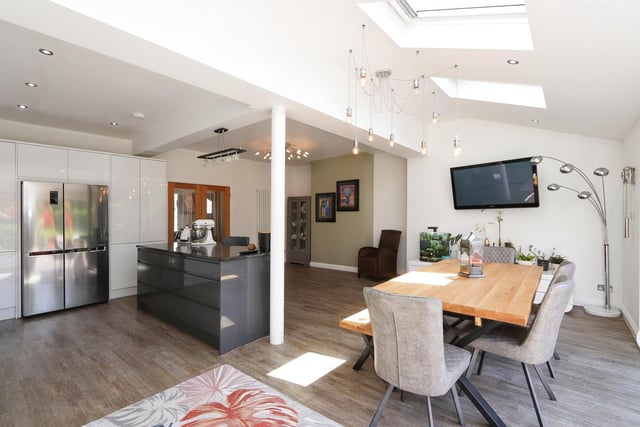 The dining area is light and bright thanks to the three velux windows in the ceiling.