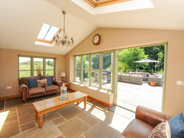 The garden room leads onto the patio.