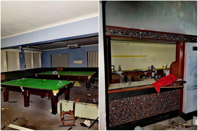 Two of the club's three snooker tables as well as the hatch into the kitchen.