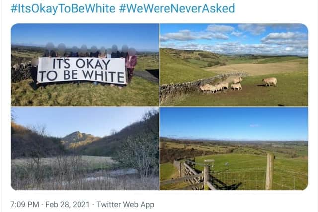 The East Midlands Patriotic Alternative group took pictures in the Peak District with a flag that read 'It's ok to be white'. Credit: Twitter.
