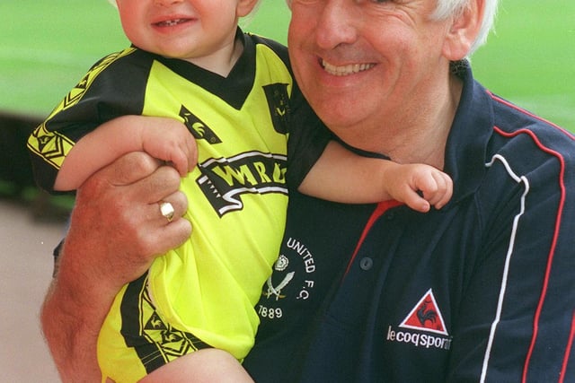 Pictured  making his first visit to Bramall Lane after being registered as a young blade at the age of two weeks is one-year-old Matthew Nundy with Grandad Arthur Jones in 1999