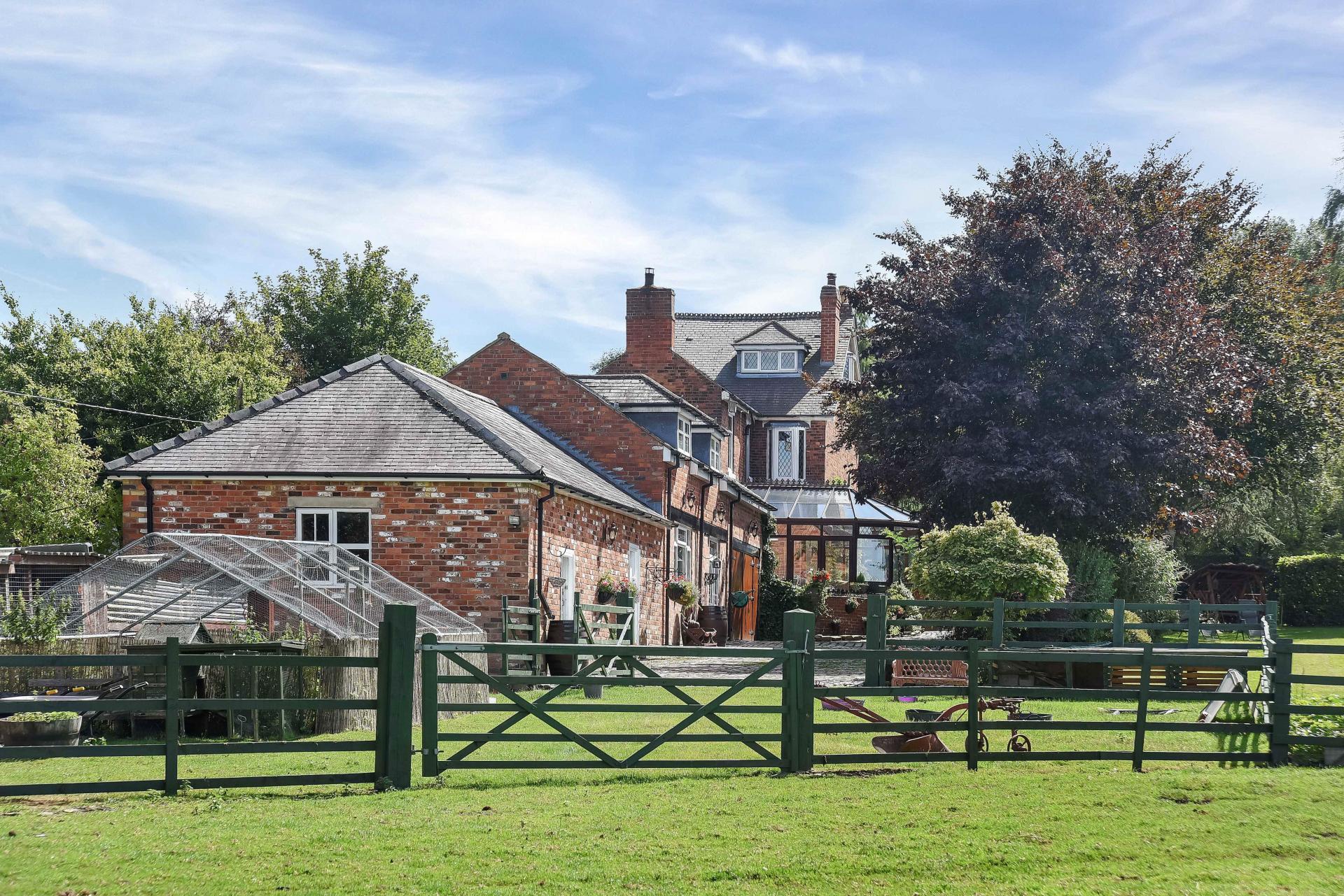 The Hollies on Park Lane, Kirkby, dates back to the early 1900’s has a range of outbuildings, annex and “beautiful grounds”.