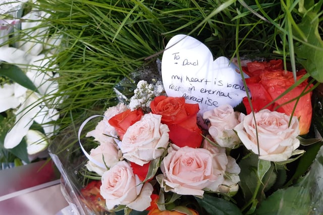 A tribute left by loved ones next to Retford Road, Woodhouse Mill, after a man died in a tragic crash on Monday night