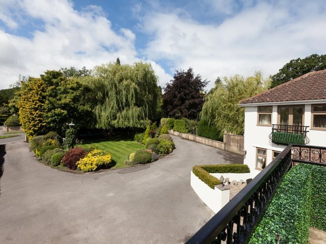 Both the master and second bedroom each feature a balcony that overlooks the front of the property, with wrought iron railings, exterior lighting and space for seating.
