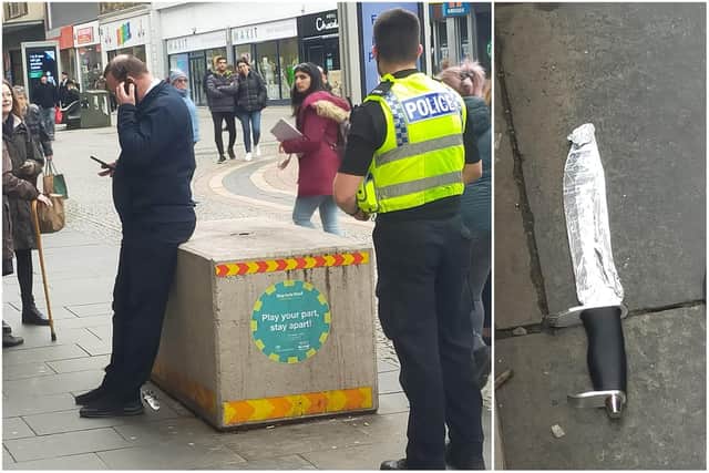 A member of Boots' security staff was pictured standing guard over a large, discarded knife in Sheffield city centre following an incident.