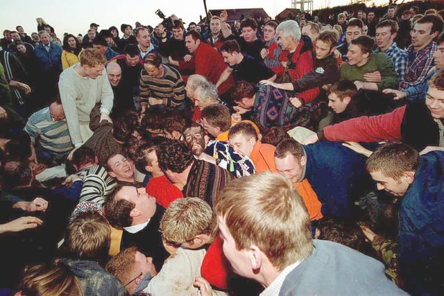 Local pub teams battled it out as they battle for possession of the Haxey Hood in 2000