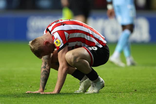 Oli McBurnie reacts at the end of the Sky Bet Championship between Coventry City and Sheffield United at The Coventry Building Society Arena: Catherine Ivill/Getty Images