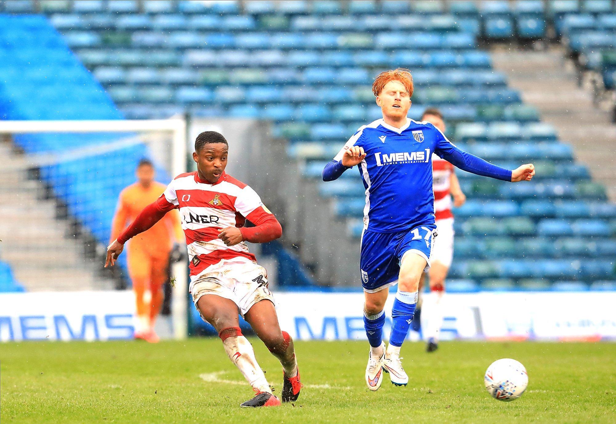 Niall Ennis plays a pass during the away game at Gillingham