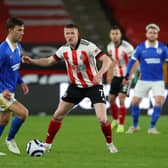 John Lundstram is a free agent after leaving Sheffield United and has been linked with Rangers: Simon Bellis / Sportimage