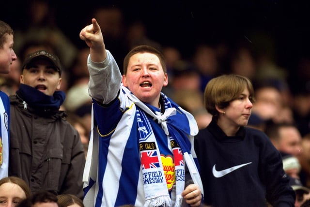 A Wednesday fan is in full voice during the Steel City derby in December 2000.