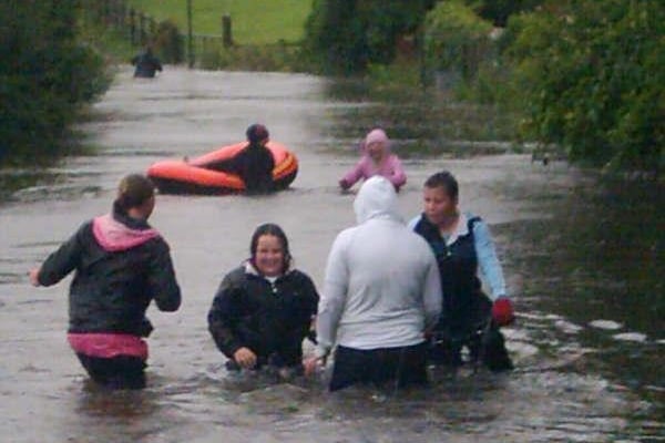 Residents of Clowne navigated their way through the floodwater.