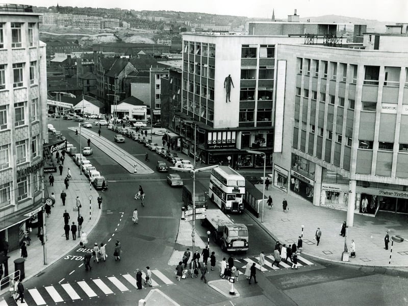 A view of Angel Street, Sheffield, showing Peter Robinson's fashion store and Hornes menswear on the right and Cockaynes department store on the left, 1965