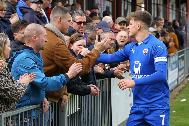 Charlie Carter greets the fans after the game.
