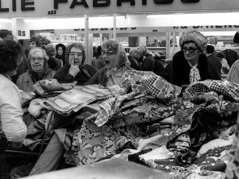 Rummaging through the fabric stall in Sheffield's Sheaf Market in 1973