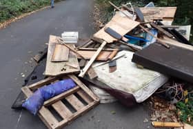 Numerous bits of wood, matresses and a sofa have been dumped on Beeley Wood Lane near Middlewood