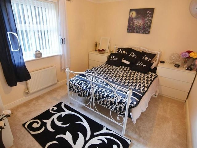 The third bedroom might be smaller than the main two, but what it lacks in size, it makes up for in style. The floor is carpeted and the window looks out on to the front of the house.