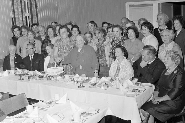 The cake cutting at the 25th Anniversary Social of Colinton Mains Parish Church Guild of Friendship in October 1964.