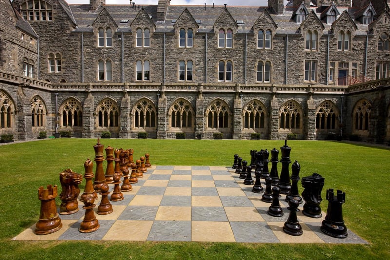 Enjoy a game of chess with a difference in the cloisters.