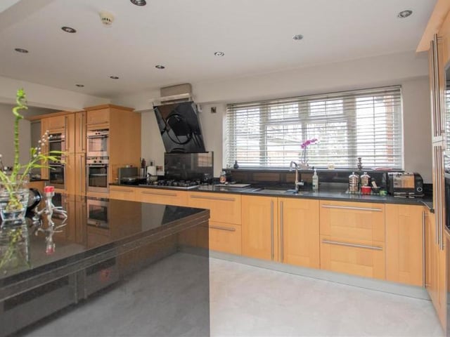 An entrance porch and a superb reception hallway guides you into the property. At the heart of it is this open-plan kitchen/diner that doubles up as a family room.