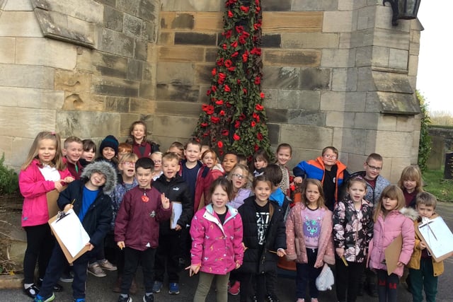 Tibshelf Infant and Nursery School pupils observed a two minute silence in front of Remembrance tiles they had created.
The children have also laid poppy pebble stones at the memorial at St. John's church in Tibshelf.