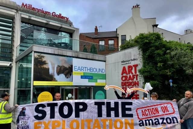 Unite campaigners in Sheffield continue action on Amazon in Northern England by raising a banner in front of the Millennium Gallery.