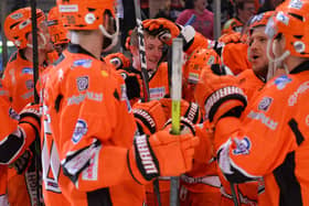 Alex Graham being mobbed by his Sheffield Steelers team mates. Pic: Dean Woolley