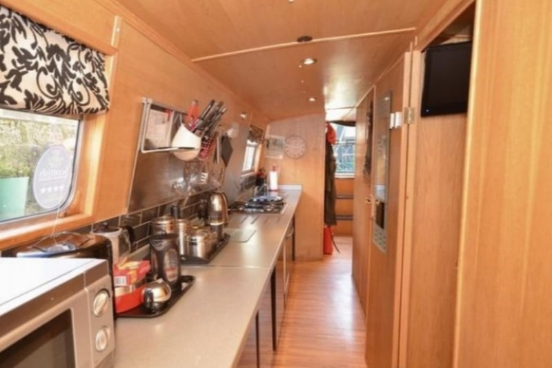 There's a fully-stocked kitchen to cook tasty meals to enjoy on-deck.